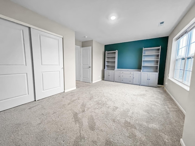 8506 Stillwater Rd, Wonder Lake, IL 60097 - unfurnished bedroom featuring carpet, baseboards, and a closet