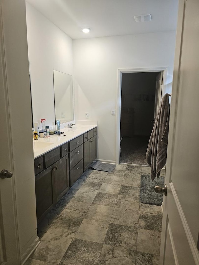 6321 Aspen Ln, Wonder Lake, IL 60097 - full bath with double vanity and stone finish flooring