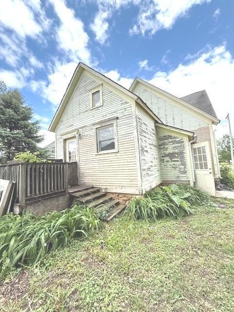 903 S Division Ave, Polo, IL 61064 - rear view of house with a deck