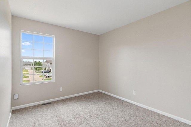 101 E Robinson Ave, Cortland, IL 60112 - spare room with baseboards and carpet flooring