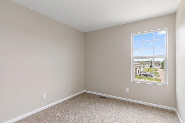 101 E Robinson Ave, Cortland, IL 60112 - carpeted empty room with baseboards