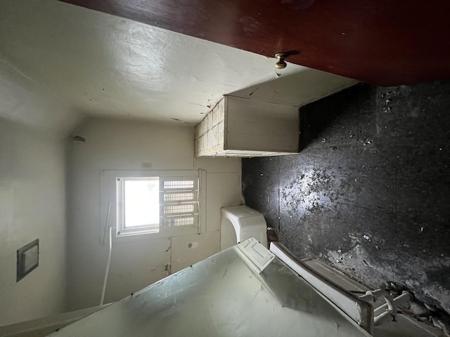 kitchen featuring washer / dryer