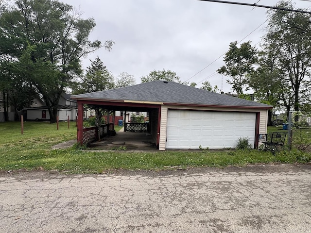 garage featuring a detached garage