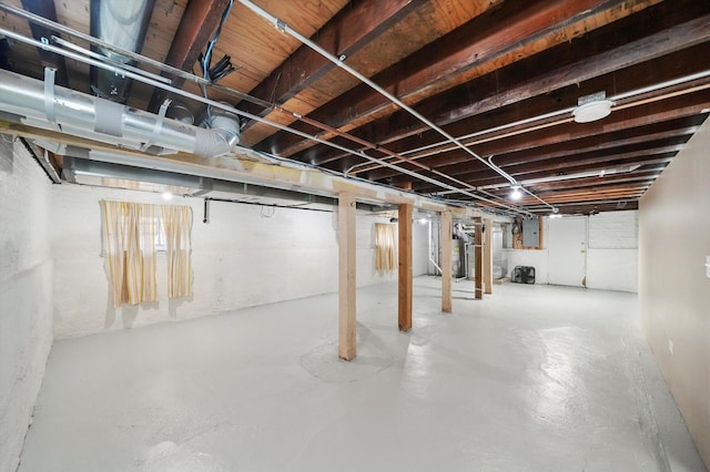 7050 26th Pkwy, Berwyn, IL 60402 - unfinished basement with electric panel and gas water heater