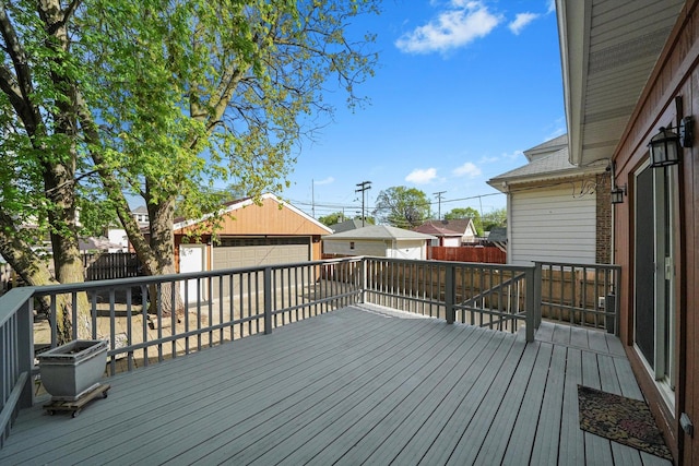 7050 26th Pkwy, Berwyn, IL 60402 - deck featuring a fenced backyard, a garage, and an outdoor structure