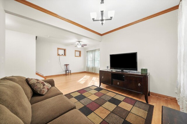 7050 26th Pkwy, Berwyn, IL 60402 - living room with wood finished floors, baseboards, and ornamental molding