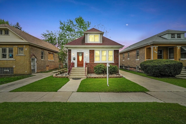 7050 26th Pkwy, Berwyn, IL 60402 - bungalow-style home with a front lawn and brick siding