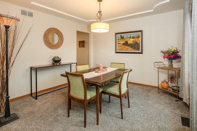 14822 S Eagle Ridge Dr, Homer Glen, IL 60491 - dining area with a raised ceiling, carpet floors, and baseboards