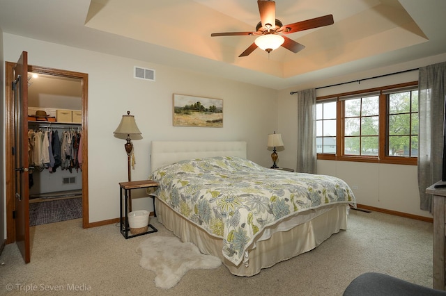 14822 S Eagle Ridge Dr, Homer Glen, IL 60491 - bedroom with a tray ceiling, carpet floors, and baseboards