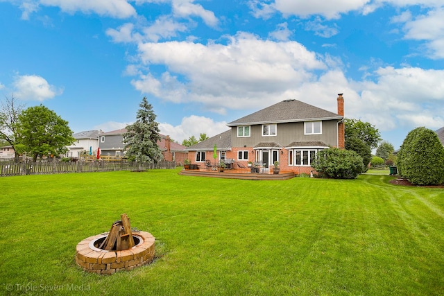 14822 S Eagle Ridge Dr, Homer Glen, IL 60491 - back of property with an outdoor fire pit, a wooden deck, a chimney, and brick siding