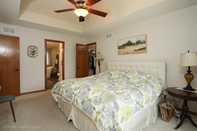14822 S Eagle Ridge Dr, Homer Glen, IL 60491 - bedroom featuring a tray ceiling, baseboards, carpet, a closet, and a walk in closet