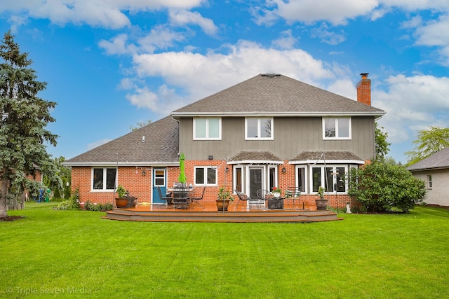14822 S Eagle Ridge Dr, Homer Glen, IL 60491 - rear view of house with a chimney, a deck, a lawn, and brick siding