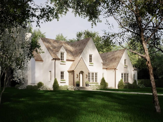 710 Buena Rd, Lake Forest, IL 60045 - view of front facade featuring a front lawn and a high end roof