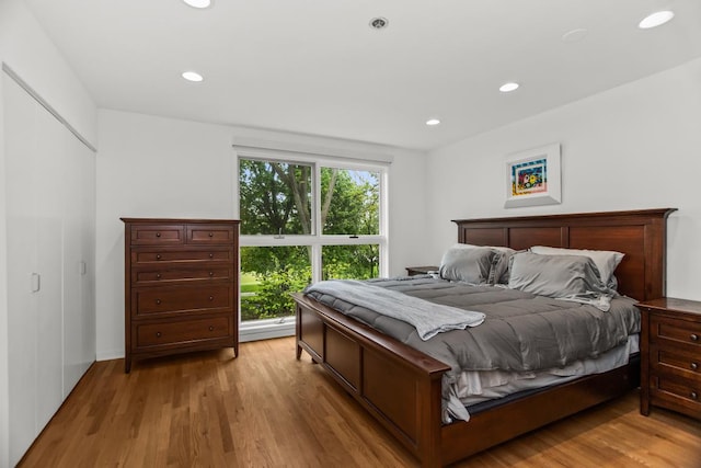 1203 Central St Unit C, Evanston, IL 60201 - bedroom featuring light wood finished floors and recessed lighting