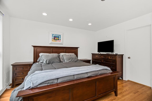 1203 Central St Unit C, Evanston, IL 60201 - bedroom with light wood-type flooring and recessed lighting