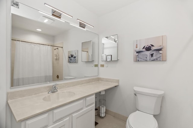 1203 Central St Unit C, Evanston, IL 60201 - bathroom featuring toilet, vanity, curtained shower, tile patterned flooring, and baseboards