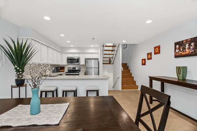 1203 Central St Unit C, Evanston, IL 60201 - dining room with stairway and recessed lighting