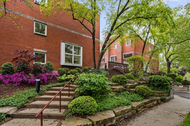 1203 Central St Unit C, Evanston, IL 60201 - view of home's exterior featuring stairway and brick siding