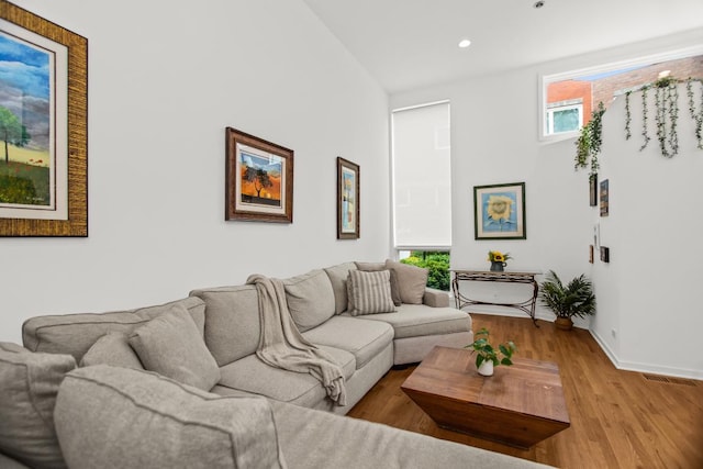 1203 Central St Unit C, Evanston, IL 60201 - living room featuring wood finished floors, recessed lighting, and baseboards