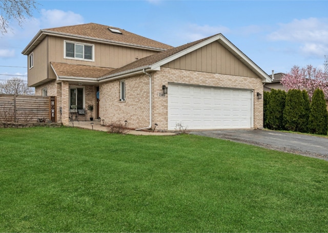 7146 S Oketo Ave, Bridgeview, IL 60455 - view of front of property with driveway, a garage, brick siding, and roof with shingles