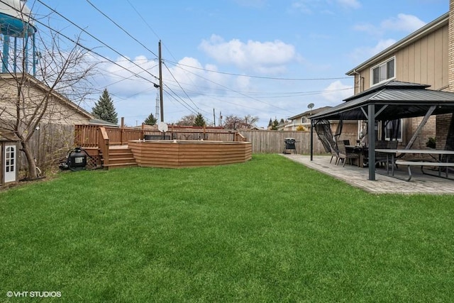 7146 S Oketo Ave, Bridgeview, IL 60455 - view of yard featuring a gazebo, a wooden deck, and a patio