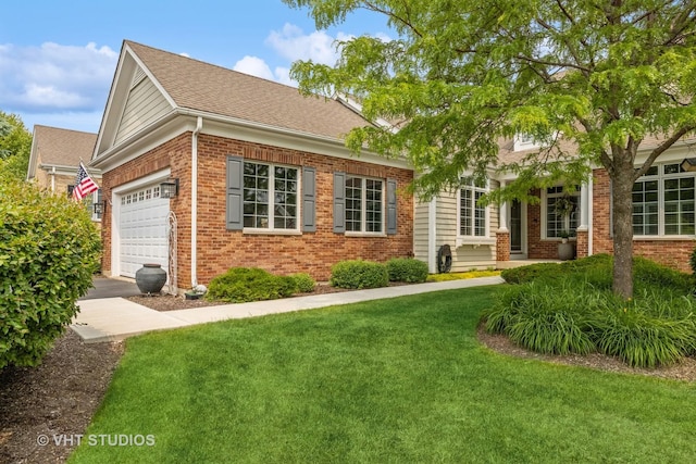 4224 Weatherstone Rd, Crystal Lake, IL 60014 - view of front of home featuring brick siding, a front lawn, a garage, and driveway