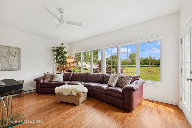 4224 Weatherstone Rd, Crystal Lake, IL 60014 - living room with light wood-type flooring, ceiling fan, and baseboards