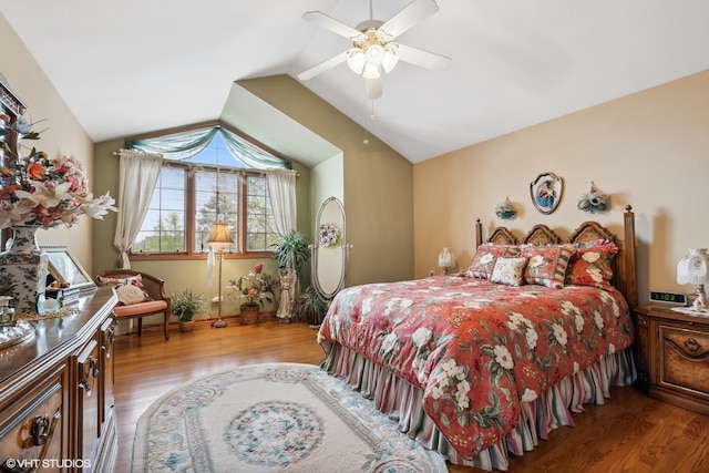 8806 175th St, Tinley Park, IL 60487 - bedroom with wood finished floors, lofted ceiling, and a ceiling fan