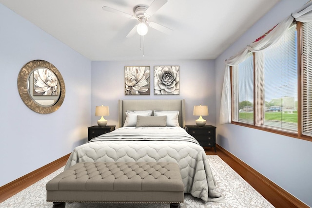 8806 175th St, Tinley Park, IL 60487 - bedroom with baseboards, wood finished floors, and ceiling fan