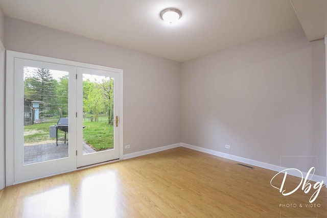 36509 N Traer Ter, Gurnee, IL 60031 - unfurnished room with light wood-style floors and baseboards