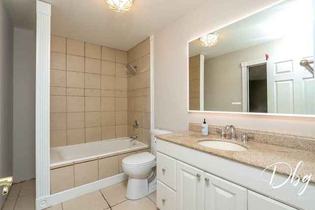 36509 N Traer Ter, Gurnee, IL 60031 - bathroom featuring vanity, tile patterned flooring, toilet, and tiled shower / bath combo