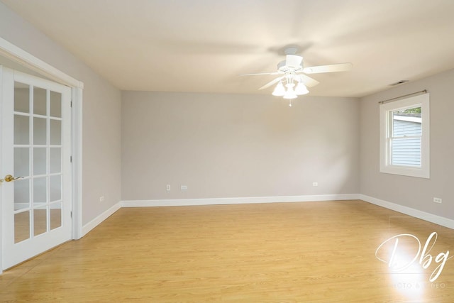 36509 N Traer Ter, Gurnee, IL 60031 - unfurnished room with light wood-style flooring, a ceiling fan, and baseboards