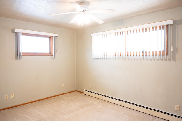 207 Muehl Dr, Lockport, IL 60441 - unfurnished room with a baseboard radiator, baseboards, ceiling fan, and light carpet