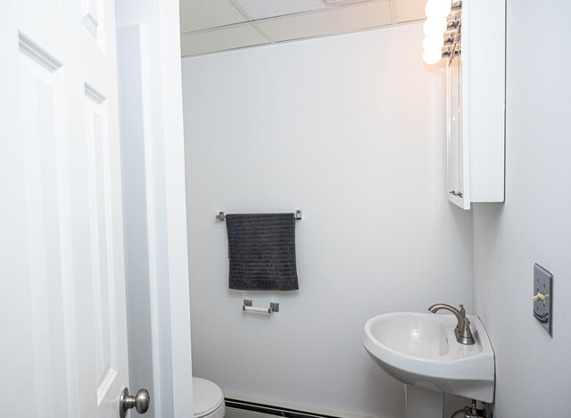 207 Muehl Dr, Lockport, IL 60441 - bathroom with a sink, toilet, and a baseboard heating unit