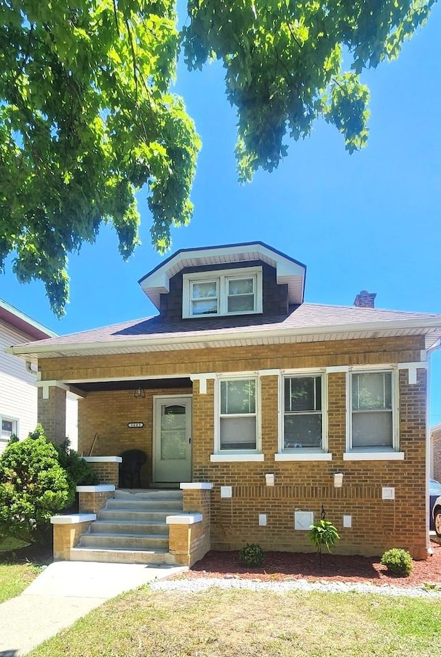 1605 S 16th Ave, Maywood, IL 60153 - bungalow featuring a porch and brick siding