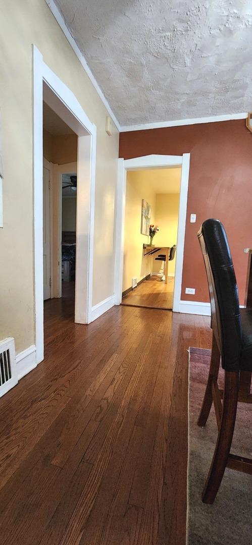 1605 S 16th Ave, Maywood, IL 60153 - office space with hardwood / wood-style floors and baseboards