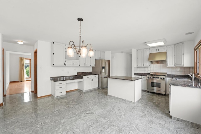 kitchen featuring stainless steel appliances, under cabinet range hood, and white cabinetry