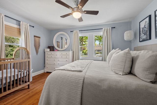 17336 65th Ave, Tinley Park, IL 60477 - bedroom featuring wood finished floors, baseboards, and ceiling fan