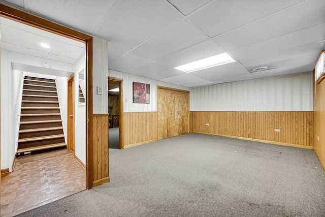 805 Highland Ave, Thornton, IL 60476 - finished below grade area featuring wainscoting, stairway, wooden walls, a drop ceiling, and carpet flooring