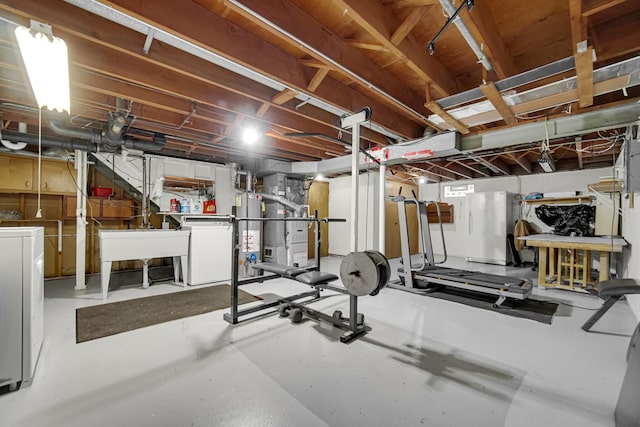 805 Highland Ave, Thornton, IL 60476 - exercise room featuring washer / dryer, a sink, and water heater