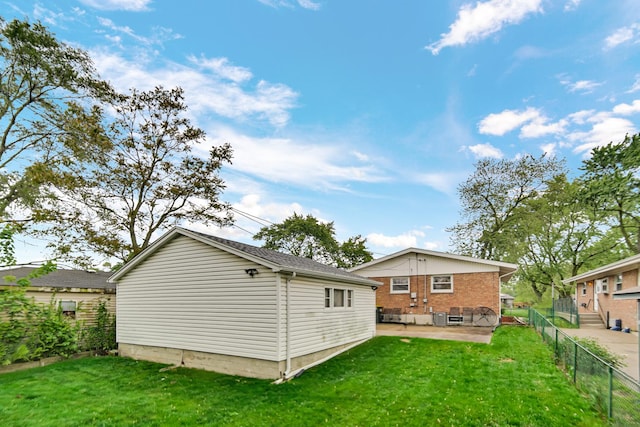 805 Highland Ave, Thornton, IL 60476 - rear view of property with a patio area and brick siding