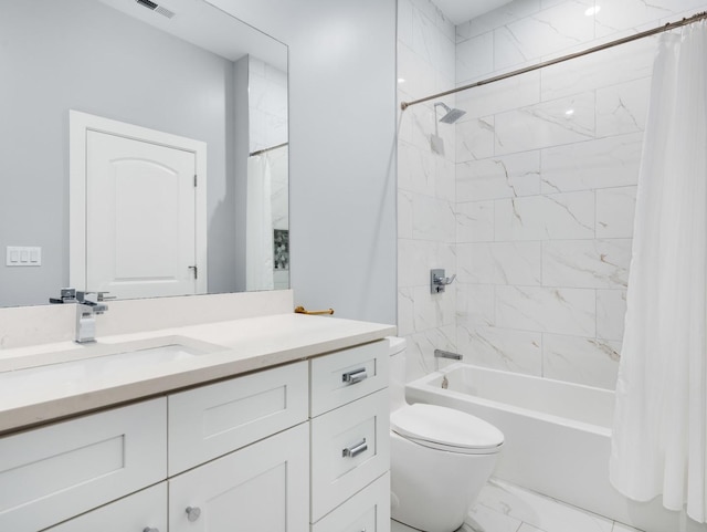 1707 S Jefferson St Unit 1, Chicago, IL 60616 - bathroom featuring vanity, toilet, shower / bath combo, and marble finish flooring