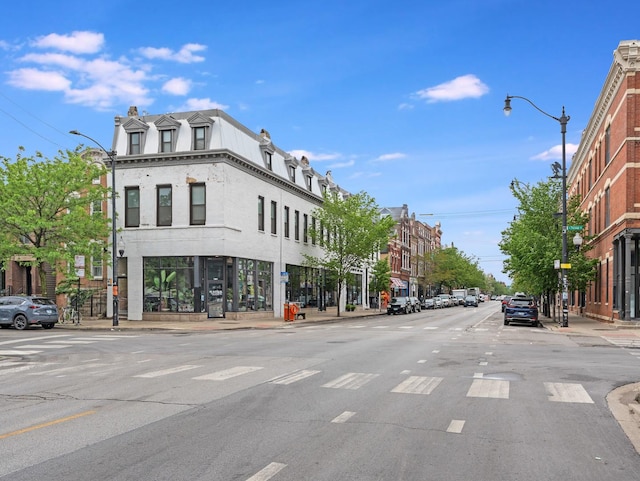 1707 S Jefferson St Unit 1, Chicago, IL 60616 - view of asphalt street with street lights, sidewalks, and curbs