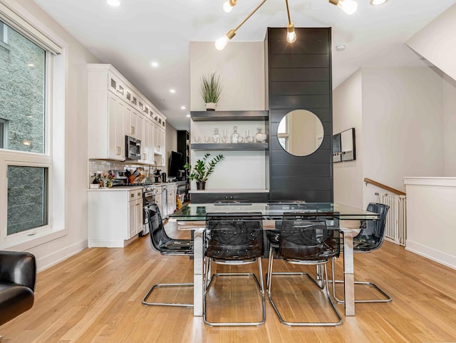 1707 S Jefferson St Unit 1, Chicago, IL 60616 - dining room featuring light wood-style floors, baseboards, and recessed lighting