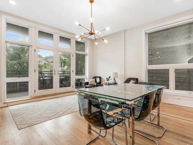 1707 S Jefferson St Unit 1, Chicago, IL 60616 - dining room with a chandelier, french doors, wood finished floors, and recessed lighting