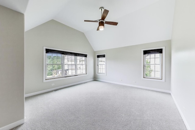 12354 S Blue Water Pkwy, Plainfield, IL 60585 - empty room featuring carpet floors, plenty of natural light, lofted ceiling, and a ceiling fan