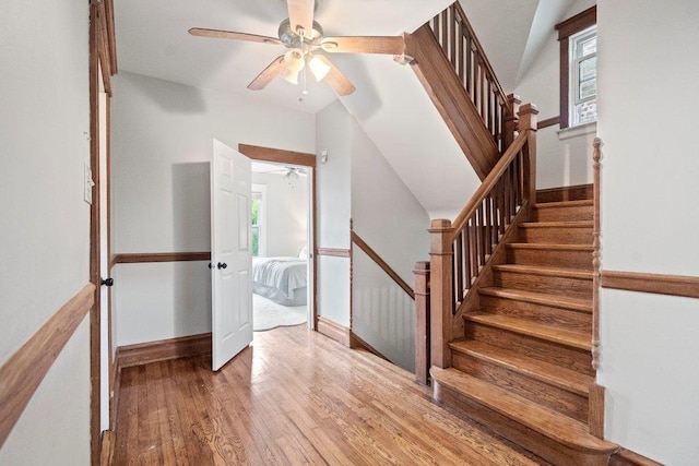 5468 S Ellis Ave, Chicago, IL 60615 - stairway with a ceiling fan, wood finished floors, plenty of natural light, and baseboards