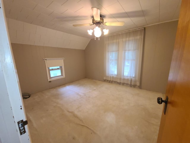 603 7th Ave, Sterling, IL 61081 - spare room with carpet, ceiling fan, and lofted ceiling
