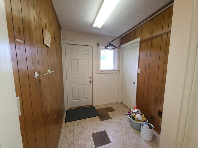 603 7th Ave, Sterling, IL 61081 - entryway with wooden walls and light floors