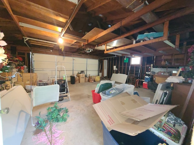 603 7th Ave, Sterling, IL 61081 - garage featuring a garage door opener